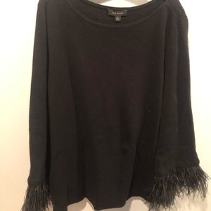 Great black holiday sweater with feather sleeve